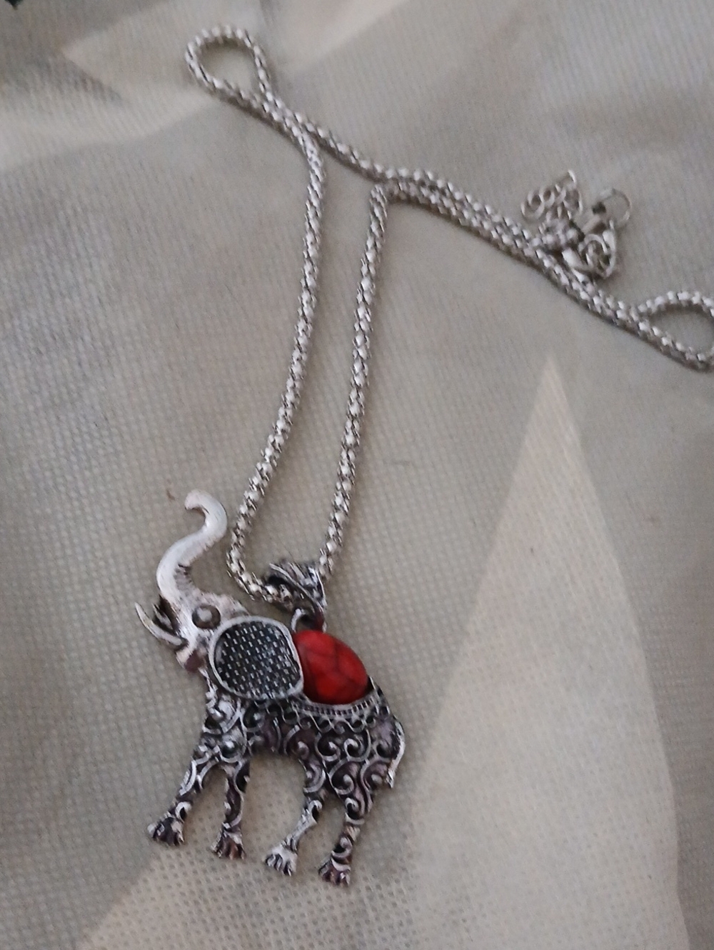 Silver Elephant Pendant Necklace with Red Accent